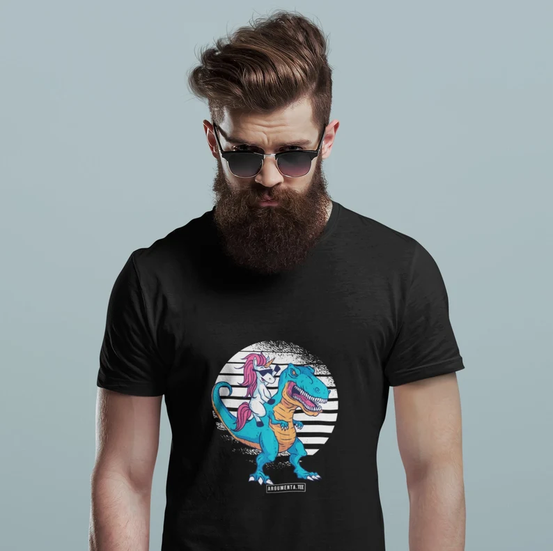 Black T shirt with a unicorn riding a T rex graphic